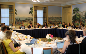 Participants at the Donor Direct Action event listen to Gloria Steinem, co-convenor of Donor Direct Action.